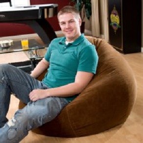 Man Sitting On Flash Furniture Bean Bag Chair